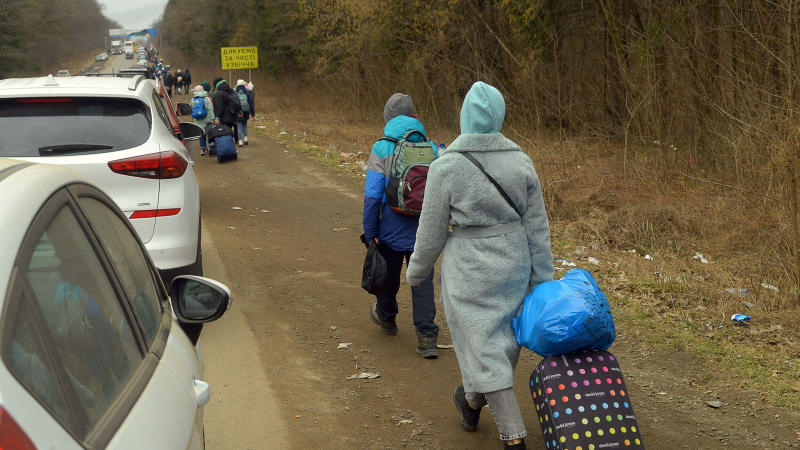 Millions of people have now fled the war in Ukraine. At the beginning of March, people made their way through Shehyni, Ukraine, towards Poland.
